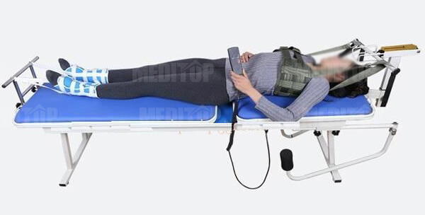 Quy trình sử dụng giường kéo giãn cột sống trong trị liệu